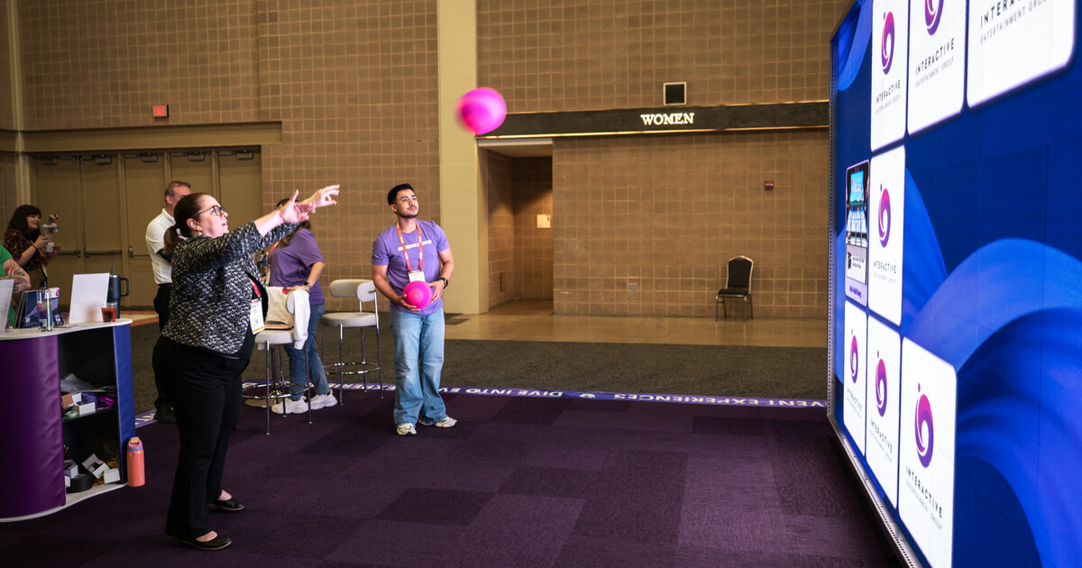 Professional event activation planning and setup with large-scale trade show floor