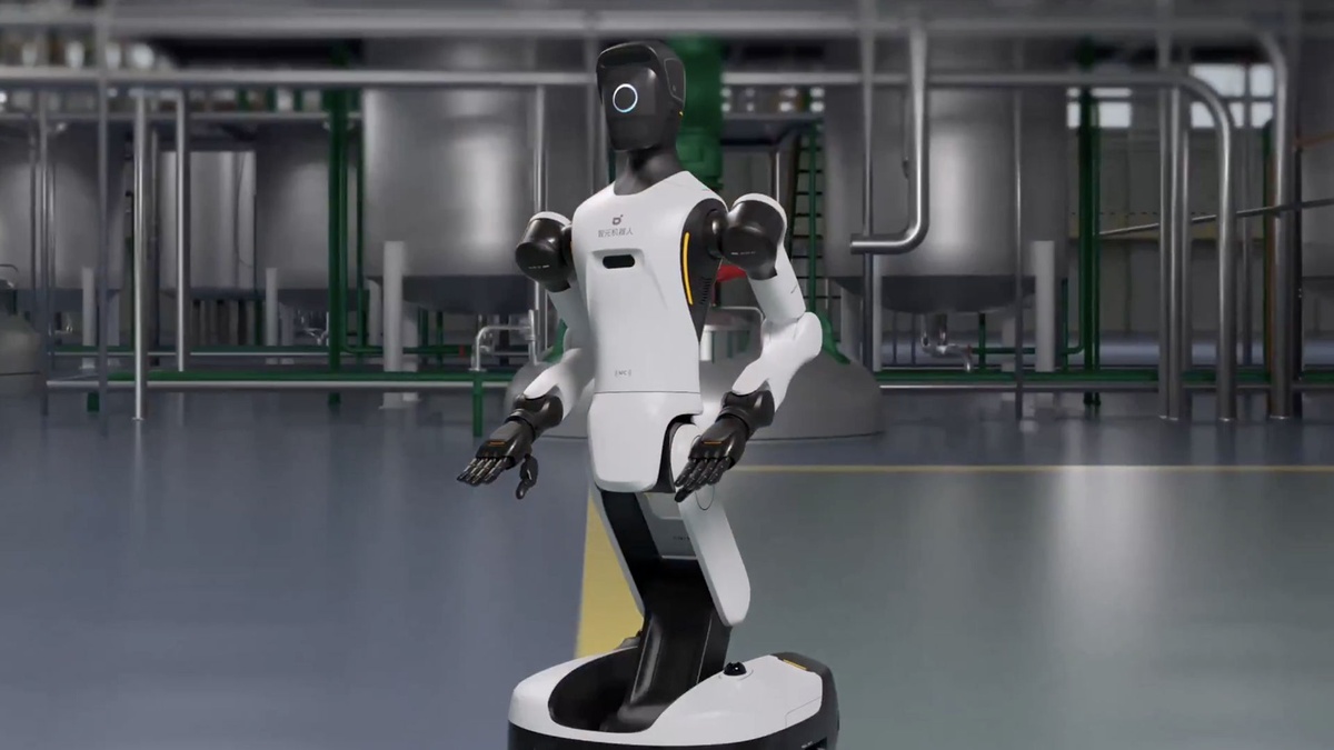 Humanoid robot engaging visitors at a Malaysian exhibition booth